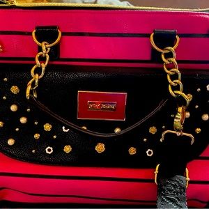 Hot pink Betsey Johnson Bag with beautiful detailing.